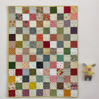 Babyquilt multicolor met hartendiefje