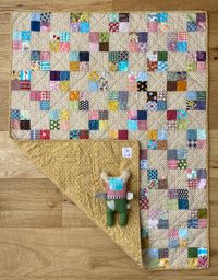 multicolor babyquilt met hartendiefje